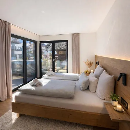 Boutique Alpi - Private Sauna & Garden Apartment Garmisch-Partenkirchen